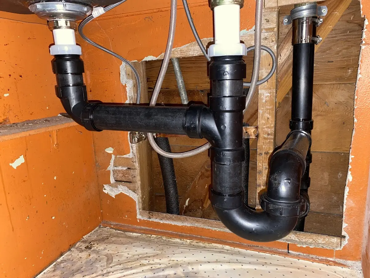 Professional Garbage Disposal Repair equipment and tools on the job in Ozark
